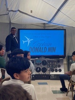 Students participate in a mock flight